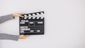 https://www.freepik.com/free-photo/human-hand-holding-clapper-board-white-background_2975728.htm