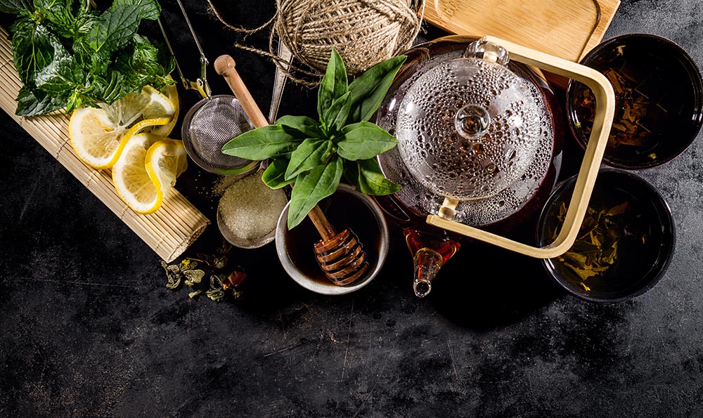 https://www.freepik.com/free-photo/tasty-fresh-green-tea-glass-teapot-ceremony-dark-background_1284563.htm